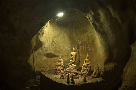 Hundreds Of Old And Faded Buddha Statues Inside The Ting Cave At The