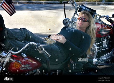 Woman Relaxing And Laying On A Motorcycle Stock Photo Alamy