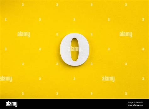Number Zero White Number In Wood On Yellow Background Stock Photo Alamy