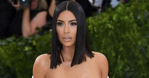 Kim Kardashian Ridiculed On Social Media After Stripping Naked Again And Posing In A Tree