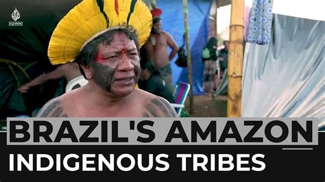 Brazil's Indigenous tribes unite to protect the Amazon - YouTube