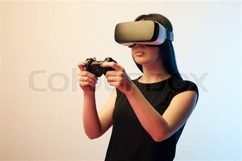 Brunette Woman Holding Joystick While Stock Image Colourbox