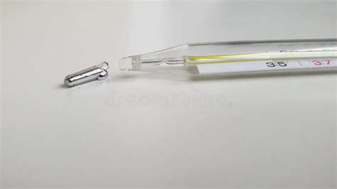 how to clean up mercury from a broken thermometer
