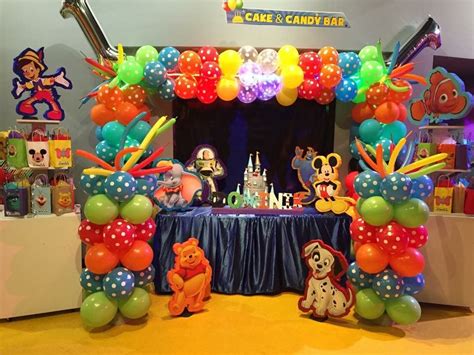 Disney Theme Party Balloon Arch, baby boys 1st birthday theme! All Disney characters | Disney ...