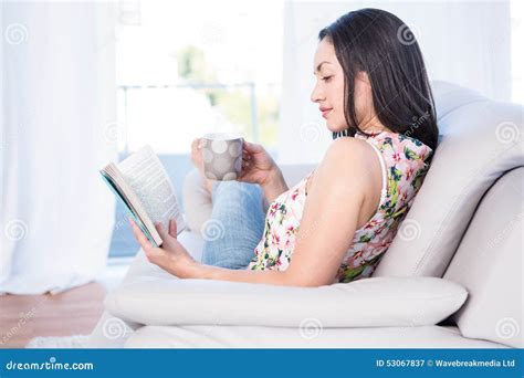 Pretty Brunette Reading On Couch Stock Image Image Of Homey Brunette 53067837