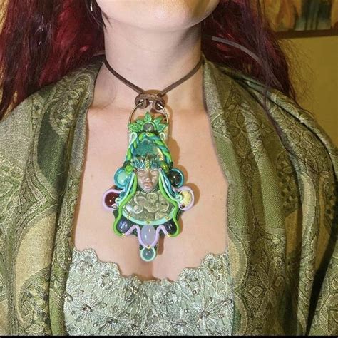 This beautiful statement talisman pendant is called... - Depop