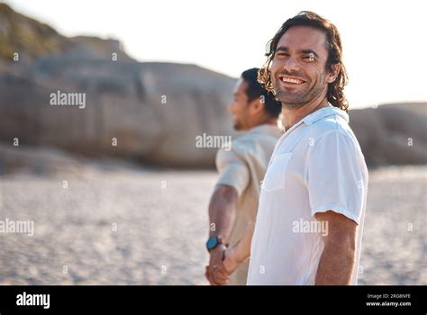 Holding Hands Portrait Or Happy Gay Couple On Beach On Fun Summer Vacation Together In Brazil