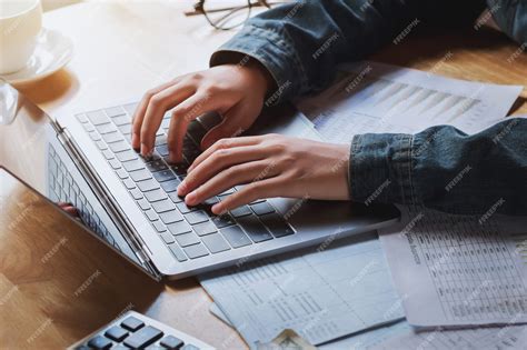 premium photo businessman working  office   laptop  desk