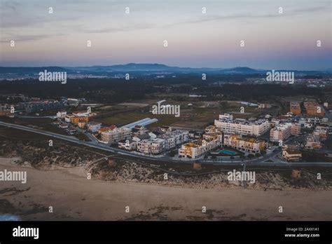 Birds Eye View Of A City With Old Buildings In The Evening With