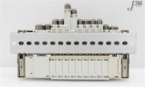 33567 SMC 10-SLOT PNEUMATIC MANIFOLD W PRESSURE SWITCH ISE35-N-65 