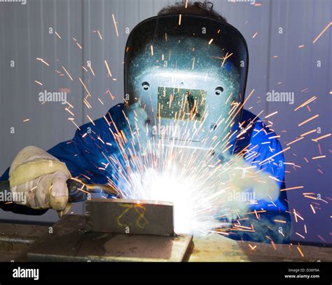 Man With Welding Helmet Welding Steel Stock Photo Alamy