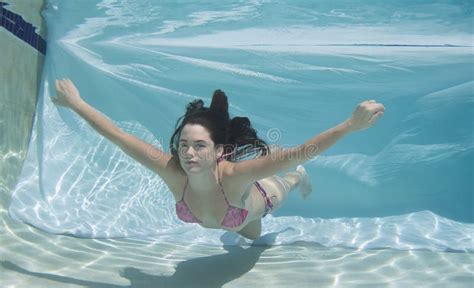 Woman Wearing A Bikini Swimsuit Holding Her Breathe Underwater Stock Image Image Of Brunette