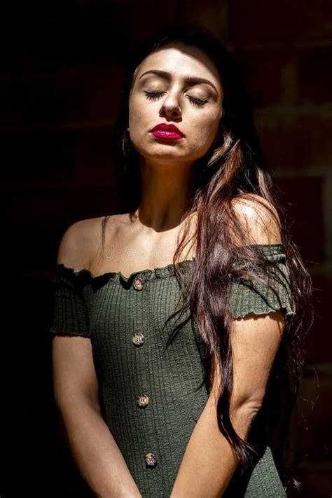 A Lovely Brunette Model Enjoys An Spring Day Outdoors Stock Photo Image Of Body Elegant