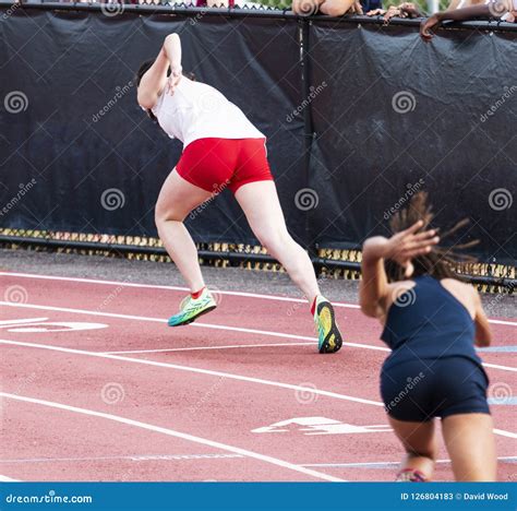 Female Sprinters Starting a Race on a Track Stock Image - Image of ...