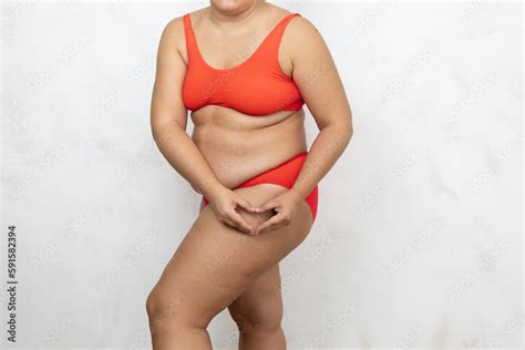 Naked Overweight Woman Show Heart Shape By Hands On Thigh White Background Woman In Red