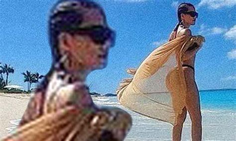 Khloe Kardashian Oozes Sex Appeal In A Black Bikini As She Poses On The Beaches Of Turks And