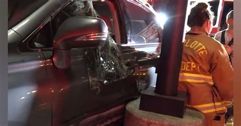 NC Firefighters Rescue Woman Stuck Between SUV, Light Pole | Firehouse