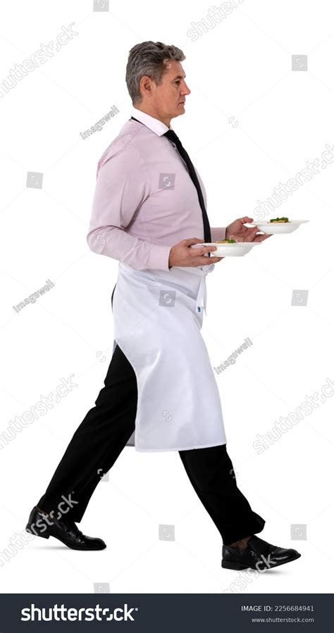 male waiter serving food isolated  stock photo  shutterstock