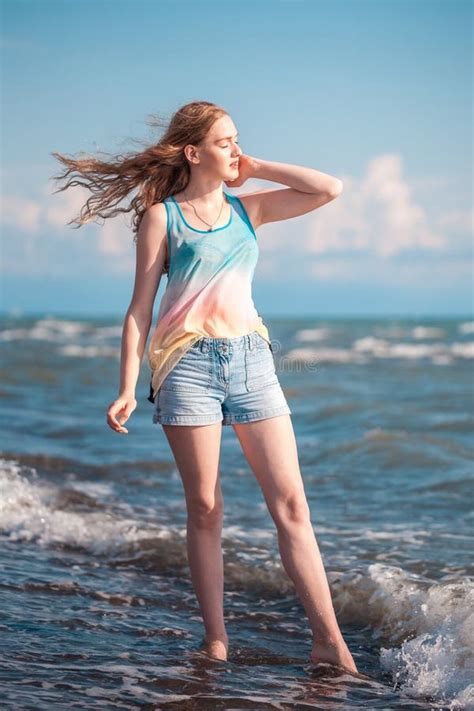 Beautiful Construction Blonde Girl In The Sea Sunny Day Stock Photo Image Of Summer Hair