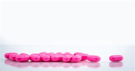 Pink Tablets Pills On White Background Pharmaceutical Industry
