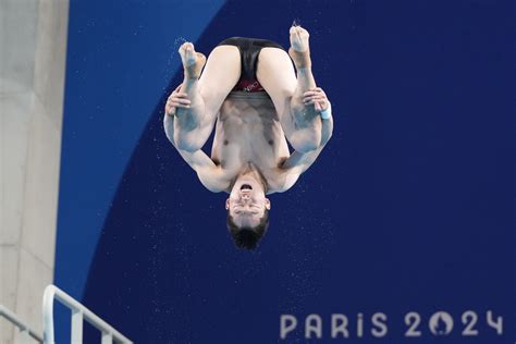 China goes 1-2 in semifinals of men's 3-meter springboard diving at