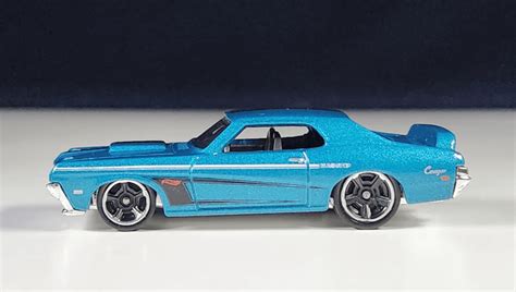 Машинка Базова Hot Wheels 69 Mercury Cougar Eliminator Muscle Mania 1 64 HTC59 Blue купити в