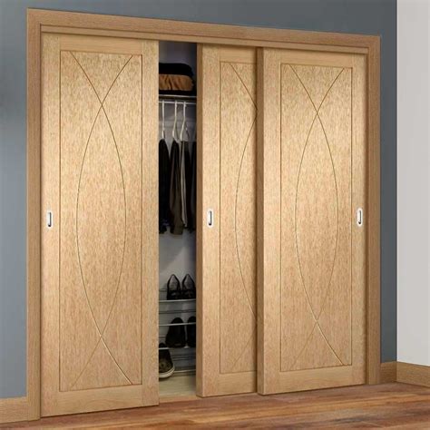 Thruslide Pesaro Oak Flush Panel 3 Door Wardrobe And Frame Kit Lifestyle Image