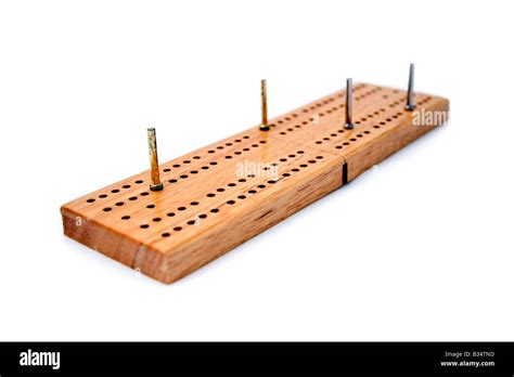 Wooden Cribbage Board And Pegs White Background Stock Photo Alamy