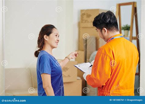 Mature Woman Talking With Delivery Man Stock Image Image Of Telling Delivery