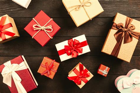 Wrapped T Boxes With Ribbons On Table · Free Stock Photo