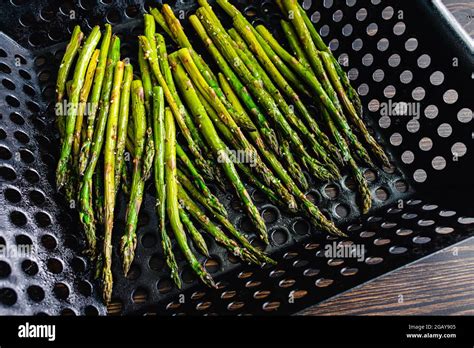 Roasted Asparagus Spears In A Grill Wok Pan Roasted Asparagus Seasoned