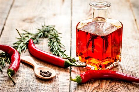 Bottle With Chili Oil And Herbs On Stone Background Stock Image - Image of desk, ingredient ...