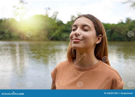 Reconnect With Nature Young Woman With Closed Eyes Enjoying Breathing