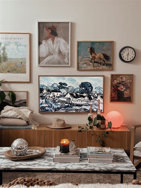 cozy living room  frame tv gallery wall  blush home blog
