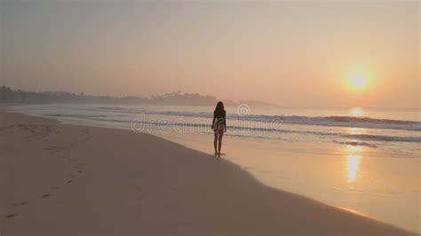 Stunning Beach Footage Drone Of Slim Bikini Girl Walking At Sunrise Stock Footage Video Of