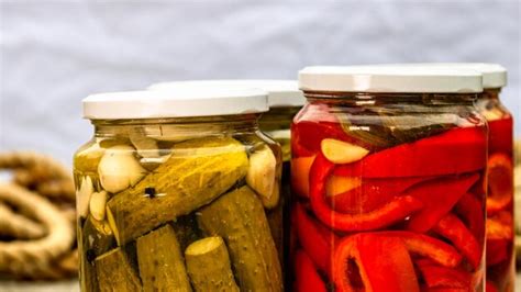 Premium Photo Glass Jars With Pickled Red Bell Peppers And Pickled