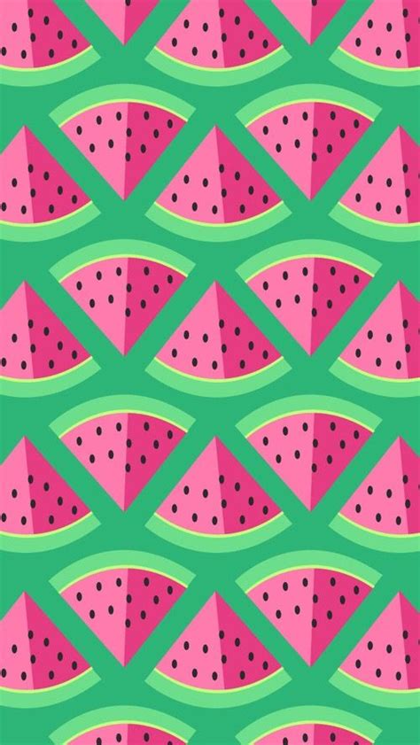 Watermelon Slices Are Arranged In Rows On A Green Background With