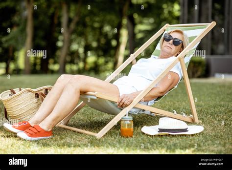 Mature Woman Sunbathing Hi Res Stock Photography And Images Alamy