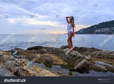 Sexy Blonde Woman White Swimsuit Standing Stock Photo 1086675458 Shutterstock