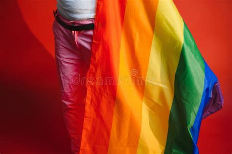Happy Gay Man Having Fun Holding Rainbow Flag Symbol Of Lgbtq Community Stock Image Image Of