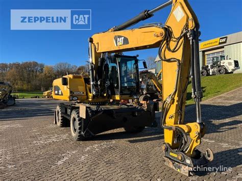 Caterpillar M322D wheel excavator for sale Germany Illingen, KE36971