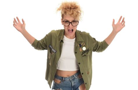 Premium Photo Beautiful Crazy Blonde Woman Holding Glasses Puffing Cheeks With Funny Face