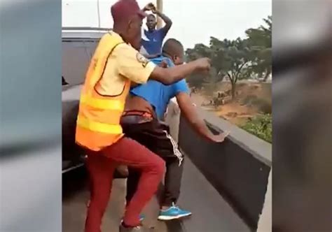 Video Motorist Knocks Police Officer Into Canal In Lagos