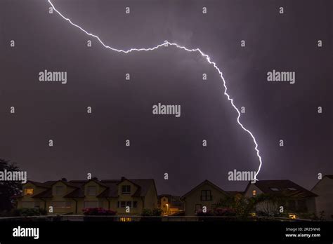 Image Of Lightning In The Night Hitting Badly A House On The Ground