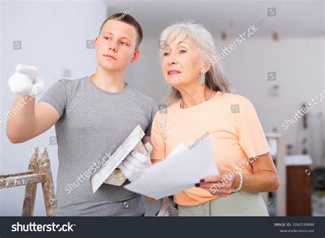 Mature Woman Studying Documentation Fifteenyearold Worker Stock Photo Shutterstock