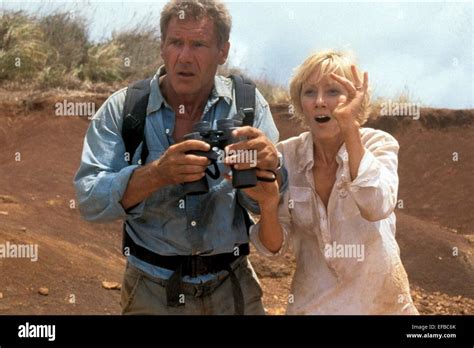 HARRISON FORD & ANNE HECHE SIX DAYS SEVEN NIGHTS (1998 Stock Photo