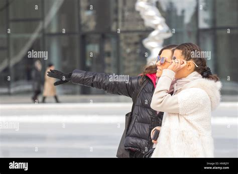 Two Beautiful Brunette Women Posing On Urban Background Stock Photo Alamy