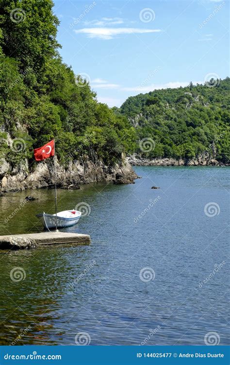 Boat Docked In A Cove Stock Image Image Of Clouds Island 144025477