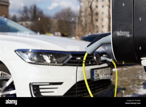 Berlin Germany Charging A Vw Passat Estate Car At A Wall Charging