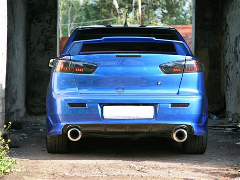 Накладка на задний бампер ZODIAK под двойной выхлоп Mitsubishi Lancer ...